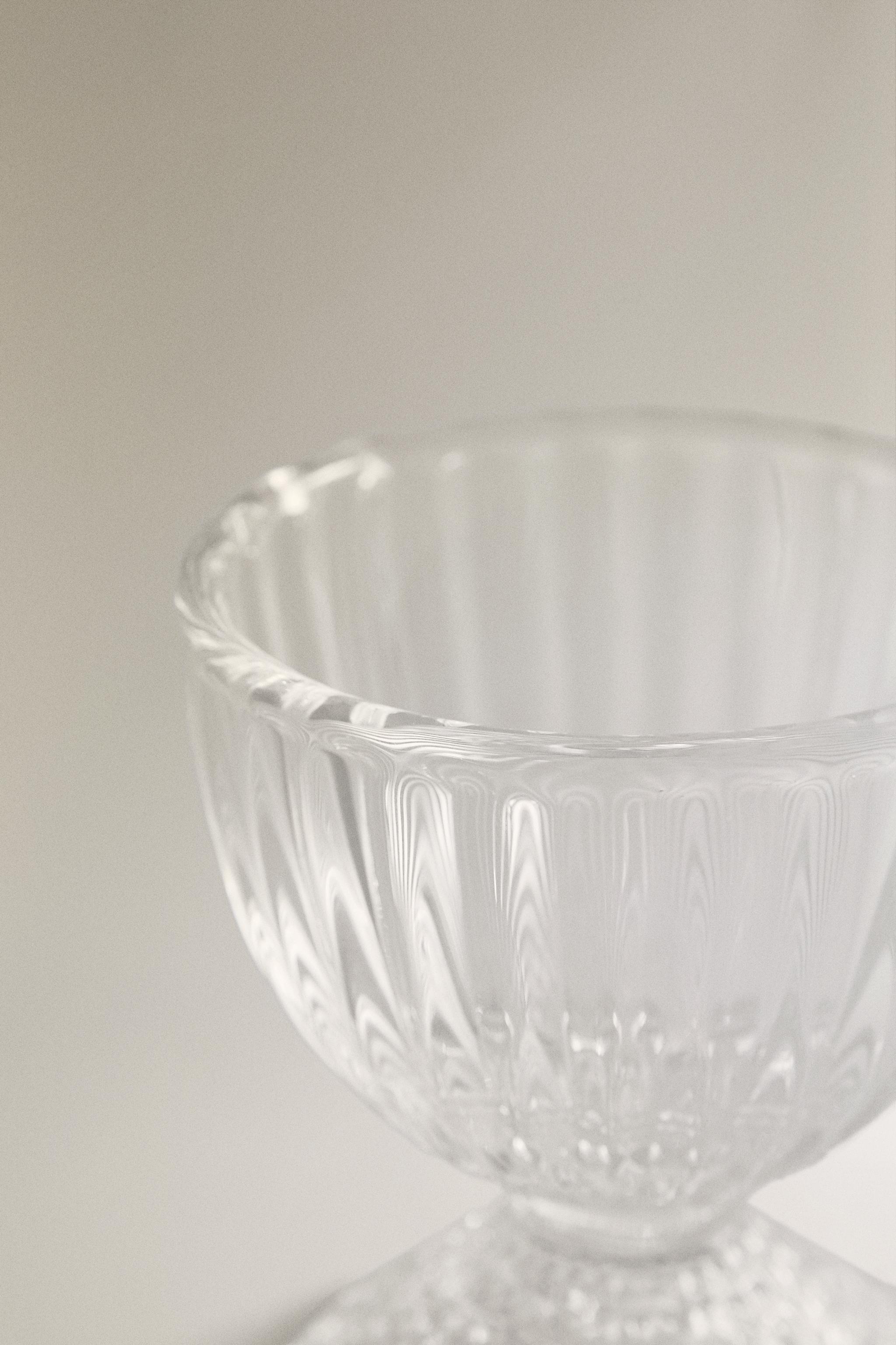GLASS EGG CUP WITH A RAISED GEOMETRIC DESIGN